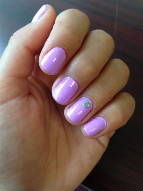 Pretty purple nails with a heart