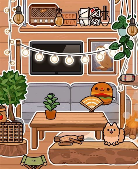 a living room filled with furniture and lots of plants on top of wooden ...