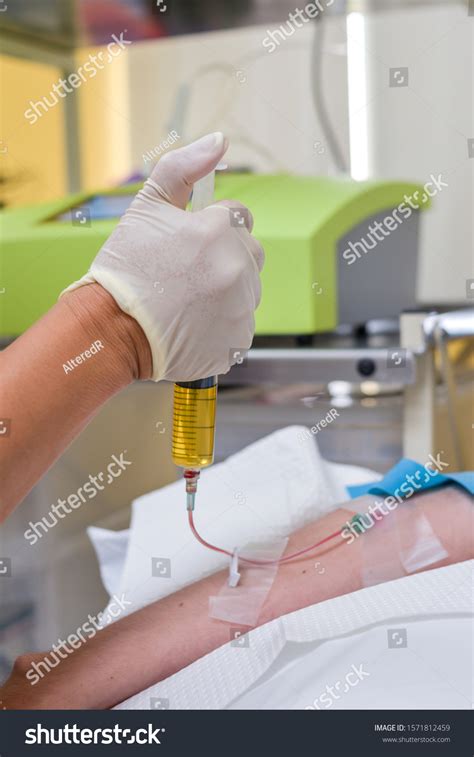doctor performing intravenous iv push stock photo  shutterstock